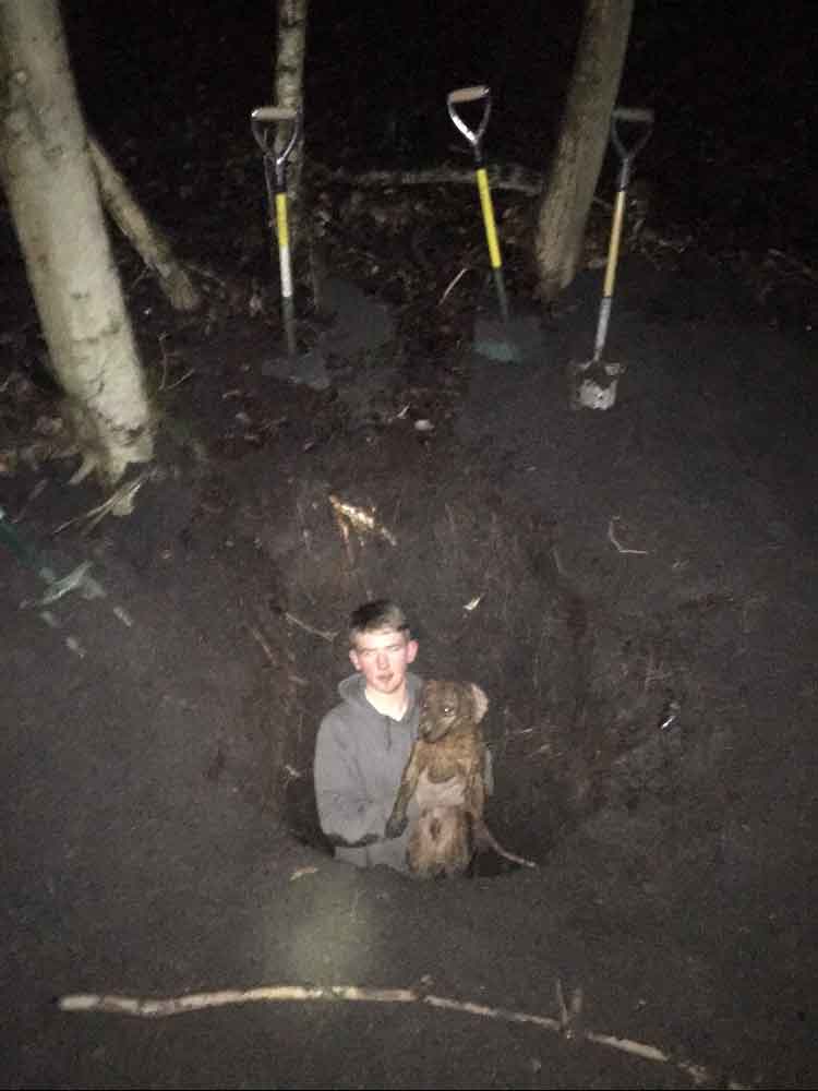 Image recovered from badger baiter Conran Connor's phone showing him in a hole in the ground with his dog